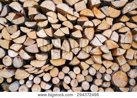 Pile Of Firewood.prepared To Fireplace For The Winter And Use For Cooking,firewood Background,stacks