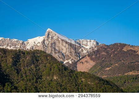 View From Village Kobarid In Soca Valley To Summit Of Mountain Krn In Julian Alps In Slovenia