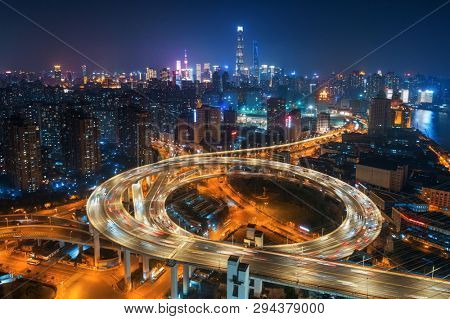 Shanghai Nanpu Bridge over Huangpu River with busy traffic in China.