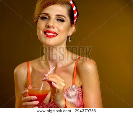 Dreams under influence of alcohol. Pin up girl drink cocktail in martini glass and daydream on alcohol night party.