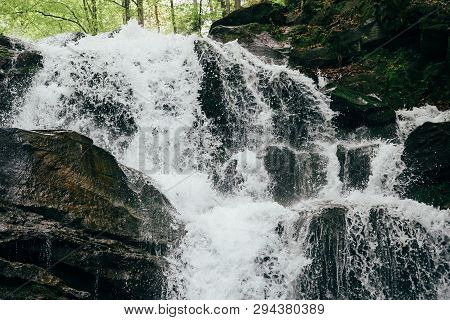 Close Up Of Cold Fresh Waterfall. Waterfall Shypit, Cascade In Pylypets In The Forest. Carpathian Mo
