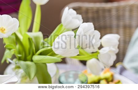 Bouquet Of White Tulips In A Vase On A Gray Background. Flowers As A Gift For Your Favorite Person. 