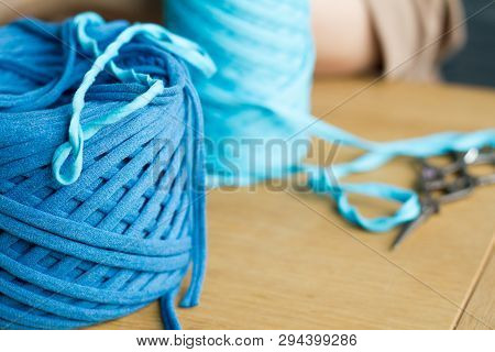 Babins With Blue And Blue Yarn For Making Handmade Knitted Bags. Selective Soft Focus. Free Space Fo