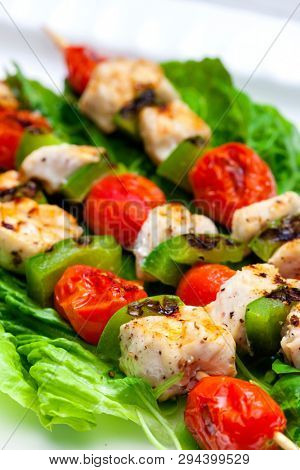 still life of meat skewers