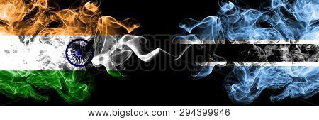 India Vs Botswana, Botswanan Smoke Flags Placed Side By Side. Thick Colored Silky Smoke Flags Of Ind