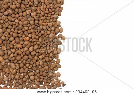 Lot Of Whole Brown Clay Pebbles (leca) Copyspace Flatlay Isolated On White Background