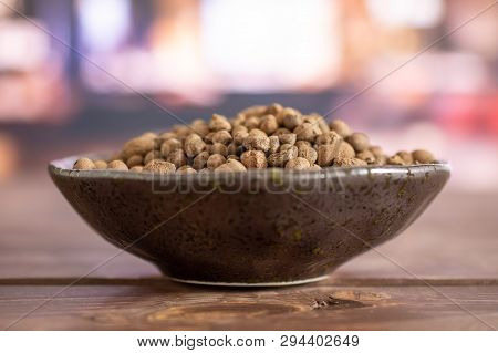 Lot Of Whole Brown Clay Pebbles (leca) On Grey Ceramic Plate In A Restaurant