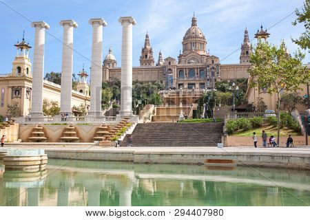 Barcelona, Spain - April 15, 2013: National art museum and fountain sunny spring day against a blue sky