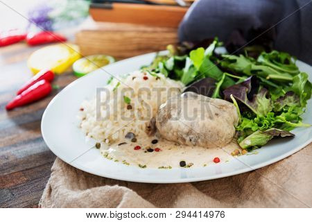 Veal Paupiette stewed with cream and rice