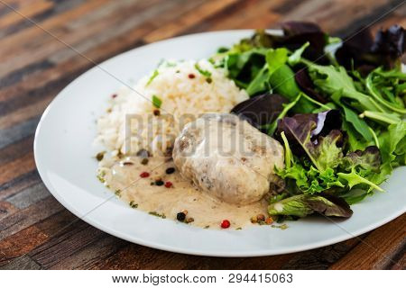 Veal Paupiette stewed with cream and rice