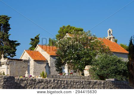 Supetar, Croatia / August 8th 2017: Petrinovic Family Mausoleum In Supetar Cemetery Old Town Supetar