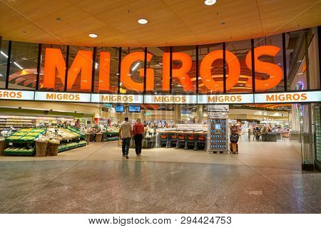 ZURICH, SWITZERLAND - CIRCA OCTOBER, 2018: entrance to Migros supermarket in Zurich International Airport. Migros is Switzerland's largest retail company.