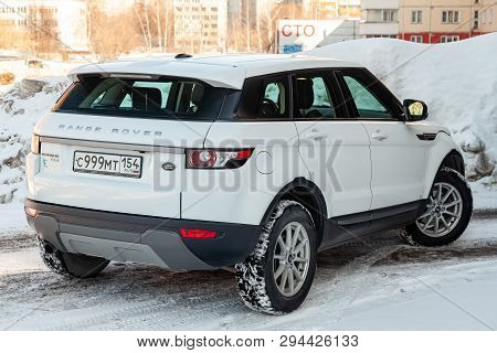 Novosibirsk, Russia - 03.10.2019: Rear View Of Range Rover Land Rover Evoque In White Color After Cl