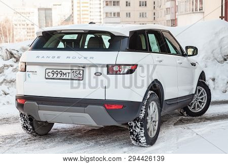 Novosibirsk, Russia - 03.10.2019: Rear View Of Range Rover Land Rover Evoque In White Color After Cl