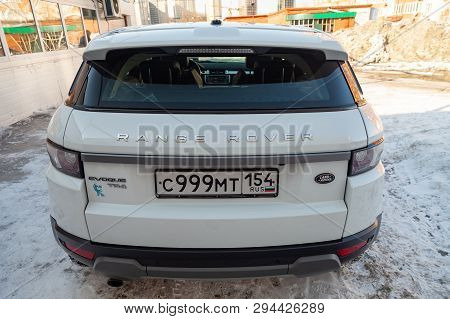 Novosibirsk, Russia - 03.10.2019: Rear View Of Range Rover Land Rover Evoque In White Color After Cl