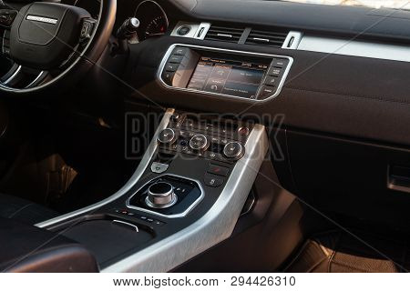 Novosibirsk, Russia - 03.10.2019: View To The Interior Of Land Rover Evoque With Dashboard, Clock, M