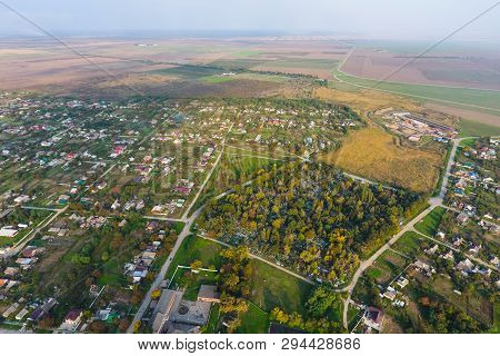 Top View Of The Village. One Can See The Roofs Of The Houses And Gardens. Road And Water In The Vill