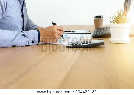 Businessman Work  On The Table With Computer Laptop Calulator ,working Data Analyses For Business Pl