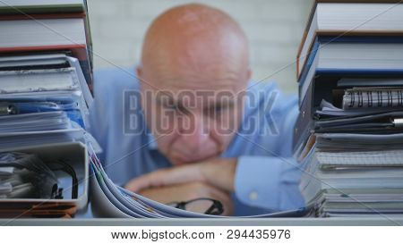Worried Depressed And Disillusioned Businessman Image In Accounting Archive