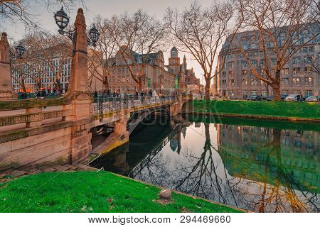 Duesseldorf, Germany - March 29, 2019: Just Married Couple Passes One Of The Bridges Across The Litt