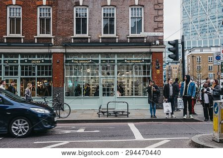 London, Uk - April 6, 2019: People Walking Past Spitalfields Market, One Of The Finest Surviving Vic