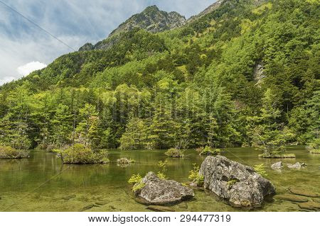 Idyllic Landscape Of Myojin Pond At Hotaka Rear Shrine In Kamikochi, Nagano, Japan