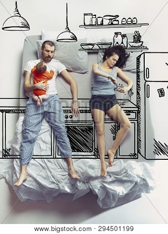 Cooking Breakfest Together. Top View Photo Of Young Couple And Their Child Or Family Sleeping In A B