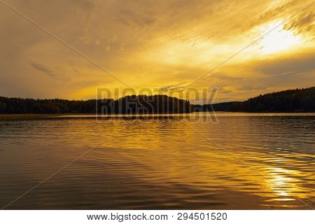 Sunset Landscape On Ladoga Lake. Karelia. Tourist Places Of Russia. Beautiful Clouds On Eveving Sky.