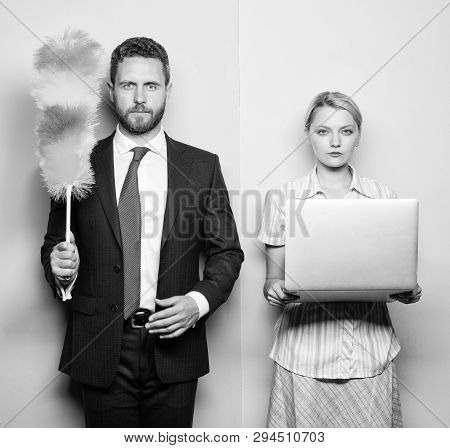 Househusband And Female Boss. Businessman And Housewife. Family Couple. Husband Stand With Dust Brus