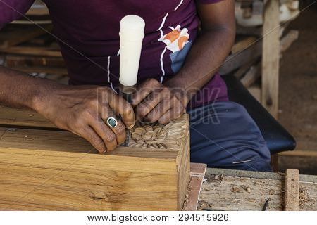 Craft Man On Work. Making Beautiful Retro Wood Pattern.
