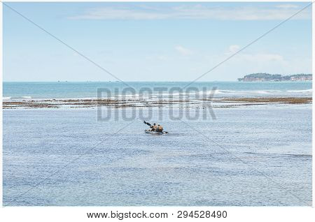 In The Middle Of Sea, Tourists Kayaking Between Banks Of Corals On Low Tide 0.0 Of Caribessa, Bessa 