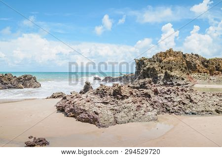 View Of Praia De Tambaba Beach, Costa Do Conde. Rock Formations On The Beach. Beautiful Brazilian No