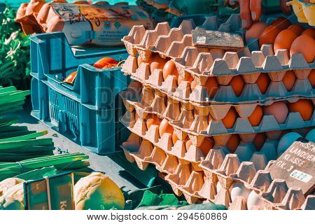 Rheydt, Germany - October 08, 2016: Fresh Eggs And Vegetables Are Piled Up On A Booth Of A Local Mar