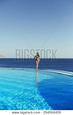 Young Woman Feel Freedom And Enjoying Relaxationin Infinity Pool , Travel And Leisure, Vacation Retr