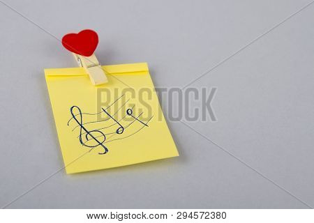 Musician. Sheet Of Paper On The Fridge. Yellow Note On The Fridge. Blank Paper Reminder. Notes. Note