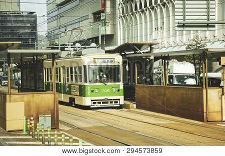 Hiroshima, Japan - April 01, 2019: Traditional Tram On Hiroshima Streets, Япония
