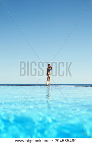Young Woman Feel Freedom And Enjoying Relaxationin Infinity Pool , Travel And Leisure, Vacation Retr