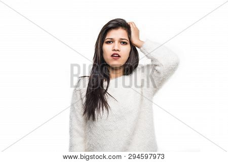 Closeup Portrait Of Confused Young Indian Woman Placing Hand On Head, Palm On Face Gesture In Duh Mo