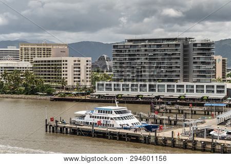 Cairns, Australia - February 17, 2019: Yacht Harbor With Many Boats Under Rainy Sky With Kuranda Nat