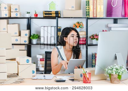 Portrait Of Young And Beautiful Asian Business Lady In Casual Fashion Dress Preparing Various Packag