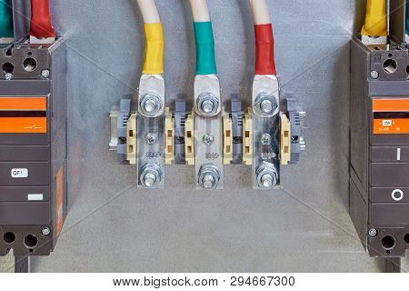 Through Bolt Terminals With Cables Connected To Them And Circuit Breakers. Terminals For Connecting 