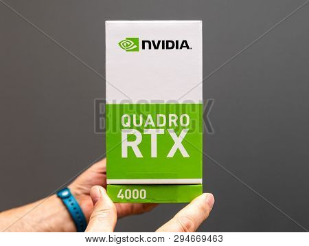 Paris France - Mar 28 2019: Senior Man Showing Cardboard Boxes Before Unboxing Of Nvidia Quadro Rtx 