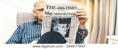 Paris, France - 29 Mar 2019: Wide Image Of Senior Man Reading In Lving Room Latest British The Times