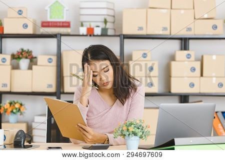 Shot Of Young And Beautiful Asian Business Lady In Casual Fashion Dress, Rechecking And Frowning On 