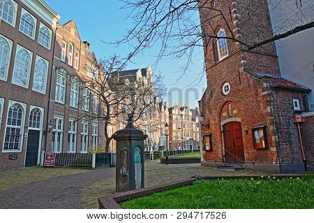 Amsterdam, Netherlands - April 05, 2019: The Internal Courtyard Of Begijnhof, One Of The Oldest Hofj