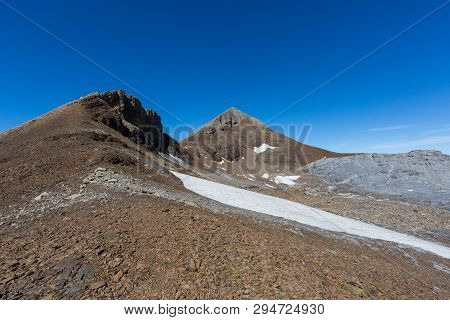 Natural Uri Rotstock Mountain Peak In Swiss Alps, Blue Sky, Summer