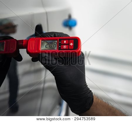 Measuring Thickness Of The Car Paint Coating With Paint Thickness Gauge