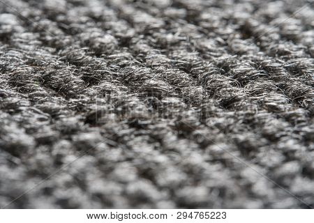 Texture Of The Gray Nylon Carpet. Textile Background With Copy Space