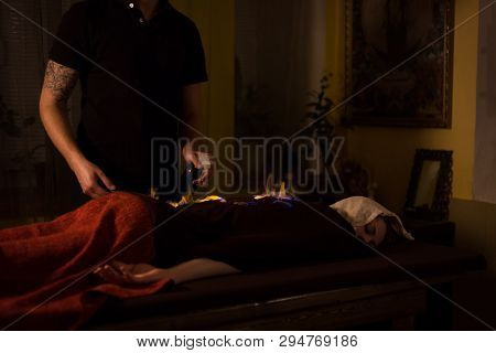 Chinese Fire Massage - Huo Liao Therapy. Traditional Chinese Medicine, Fire Treatment And Bodycare C