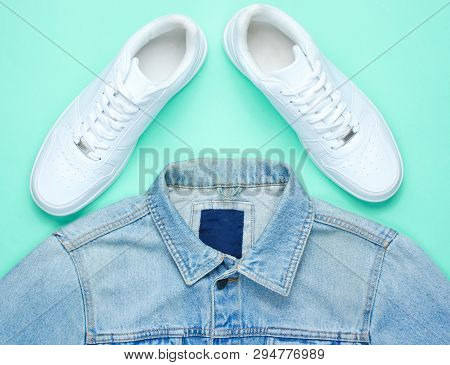 Retro Style Denim Stylish Jacket And White Hipster Sneakers On A Mint-colored Paper Background. Mini